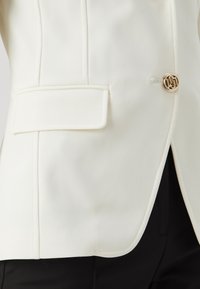 LIU JO GIACCA BOTTONI - Suknjič - star white