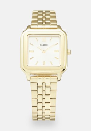 Gouden vierkante horloge met een gepolijste metalen band, witte wijzerplaat, gouden uurmarkeringen en de merknaam "CLUSE" gecentreerd onder 12 uur.