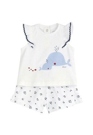 Weißes kurze Baumwollset mit einer blauen Wal-Grafik. Geräuschte Ärmel mit dunkelblauem Rand. Die Shorts haben ein florales Muster in Dunkelblau auf weißem Hintergrund.