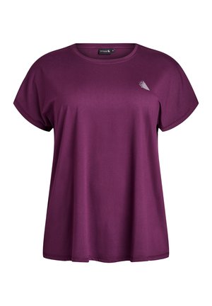 Lila t-shirt med kort ärm gjord av mjukt tyg. Har en rund halsringning och en liten grafisk bild på vänster bröstområde.