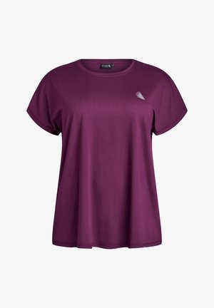 Lila Kurzarm-T-Shirt aus weichem Stoff. Mit Rundhalsausschnitt und einem kleinen Druck auf der linken Brustseite.