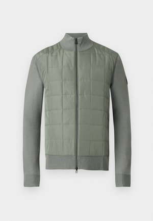 Gray lightweight jacket with quilted front panel, ribbed collar, cuffs, and hem, and full-length zipper closure.