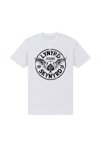 Bílý bavlněný tričko s černým kruhovým grafikou a textem "LYNYRD SKYNYRD FREEBIRD 1973" doplněným křídly a detailem v podobě srdce.