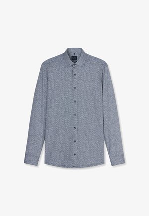 Chemise à manches longues boutonnée avec un petit motif à pois blancs sur fond bleu, col classique et boutons noirs sur le devant.
