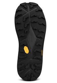 Schwarze Gummi-Außensohle mit tiefen Profilrillen für Trittsicherheit, mit einem gelben Vibram-Logo und hexagonalem Muster für Langlebigkeit und Grip.
