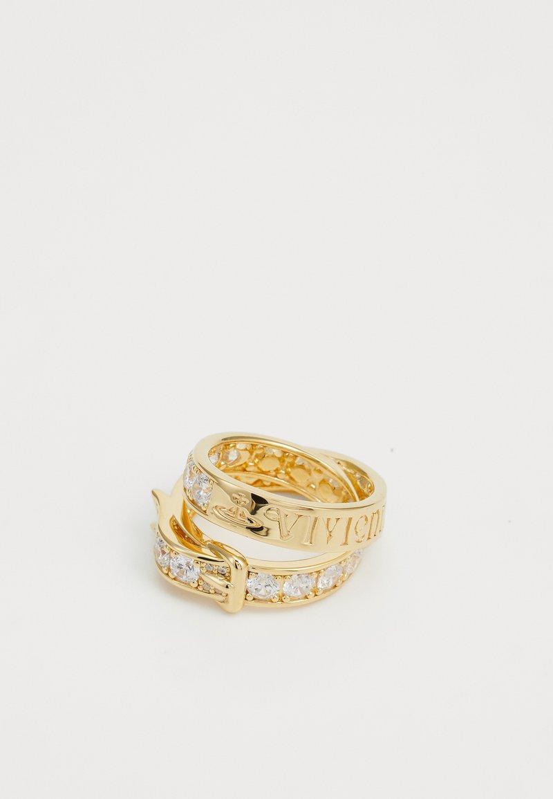 Ensemble de bagues en or comprenant deux bandes entrelacées. Une bande est gravée de texte et l'autre est ornée de cristaux transparents, mettant en valeur son design.