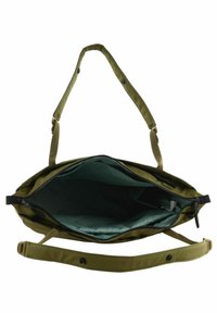 Bolso tote verde oliva con una textura suave, parte superior abierta, bolsillo interior, correa ajustable y forro en contraste de color teal.
