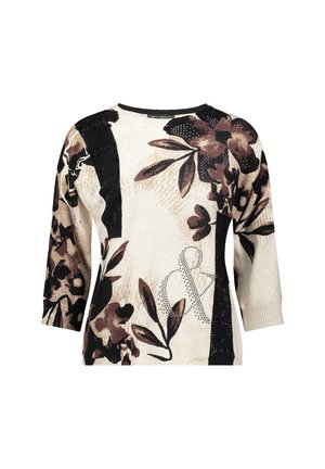 Maglione a maglia floreale con base crema e disegni marroni e neri, maniche a tre quarti e dettagli decorativi.