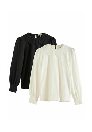 Two long-sleeve blouses: one black and one white, both with lace-trimmed round collars and gathered puff sleeves.