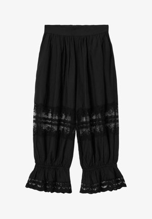 Pantalon noir ample avec taille et poignets élastiqués, présentant deux bandes horizontales de dentelle et un volant de dentelle aux ourlets.