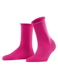 Calze alla caviglia rosa realizzate in tessuto liscio, con una fascia a coste e punta rinforzata. Il nome del marchio è stampato in modo discreto sul lato.