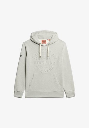 Grey hoodie with a front pocket, drawstring hood, and embossed text "Superdry" and "Standard" on the chest. Soft fabric and ribbed cuffs.