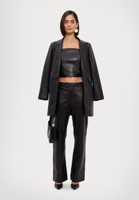 STUDIO ID DISCO PANTS - Kožené kalhoty - black