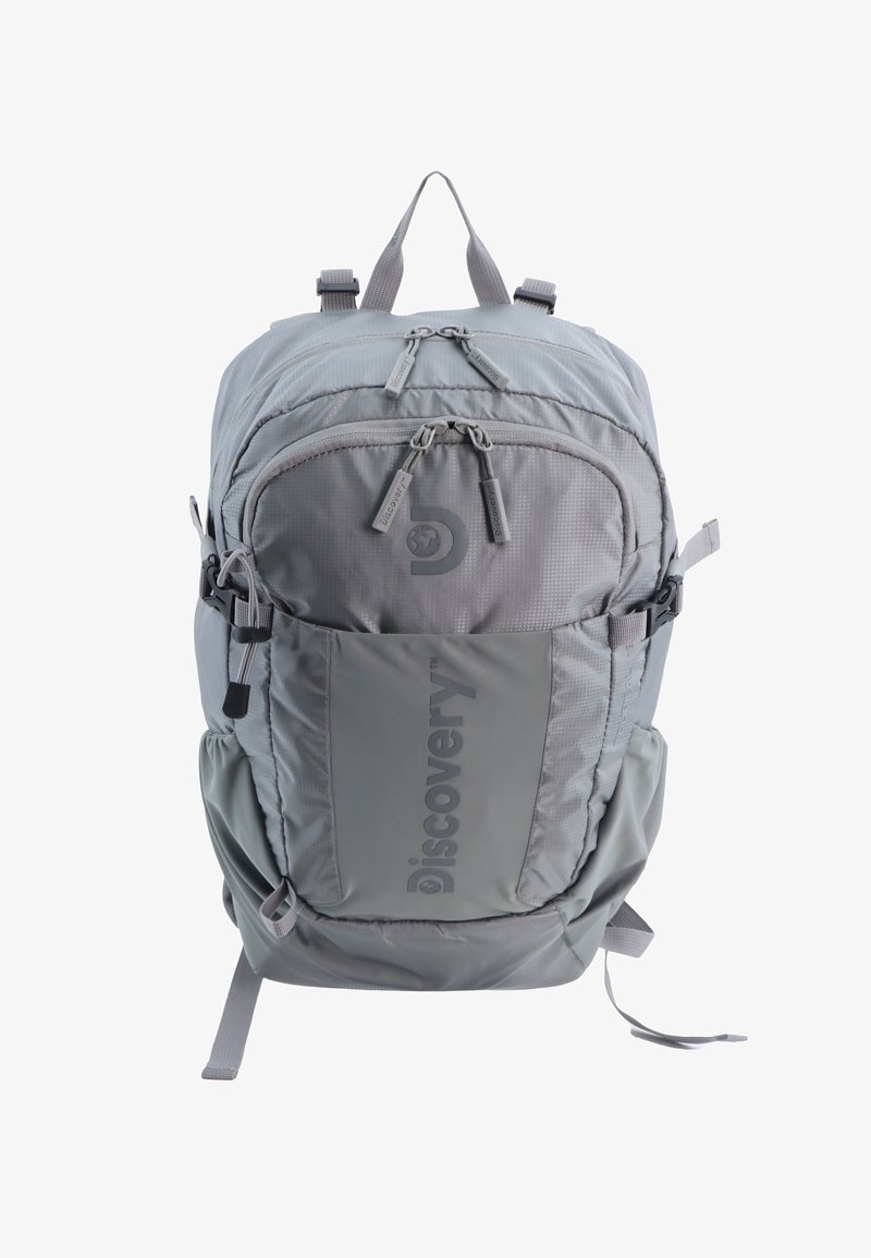 Gray backpack with a textured finish, multiple zippered compartments, adjustable straps, and a side pocket featuring a logo.