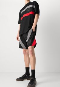 HUGO Verryttelyhousut - black