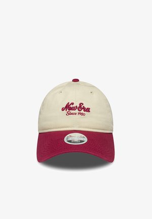 Adjustable cap made of cream fabric with a maroon visor. Features embroidered "New Era Since 1920" logo in maroon. Subtle texture on fabric.