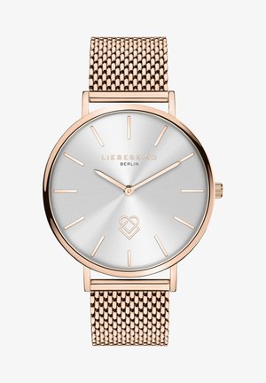 Rose gold ur med sølvskive, mesh-rem og timemarkeringer. Har et minimalistisk design, mærkenavn og logo-detajle i midten.