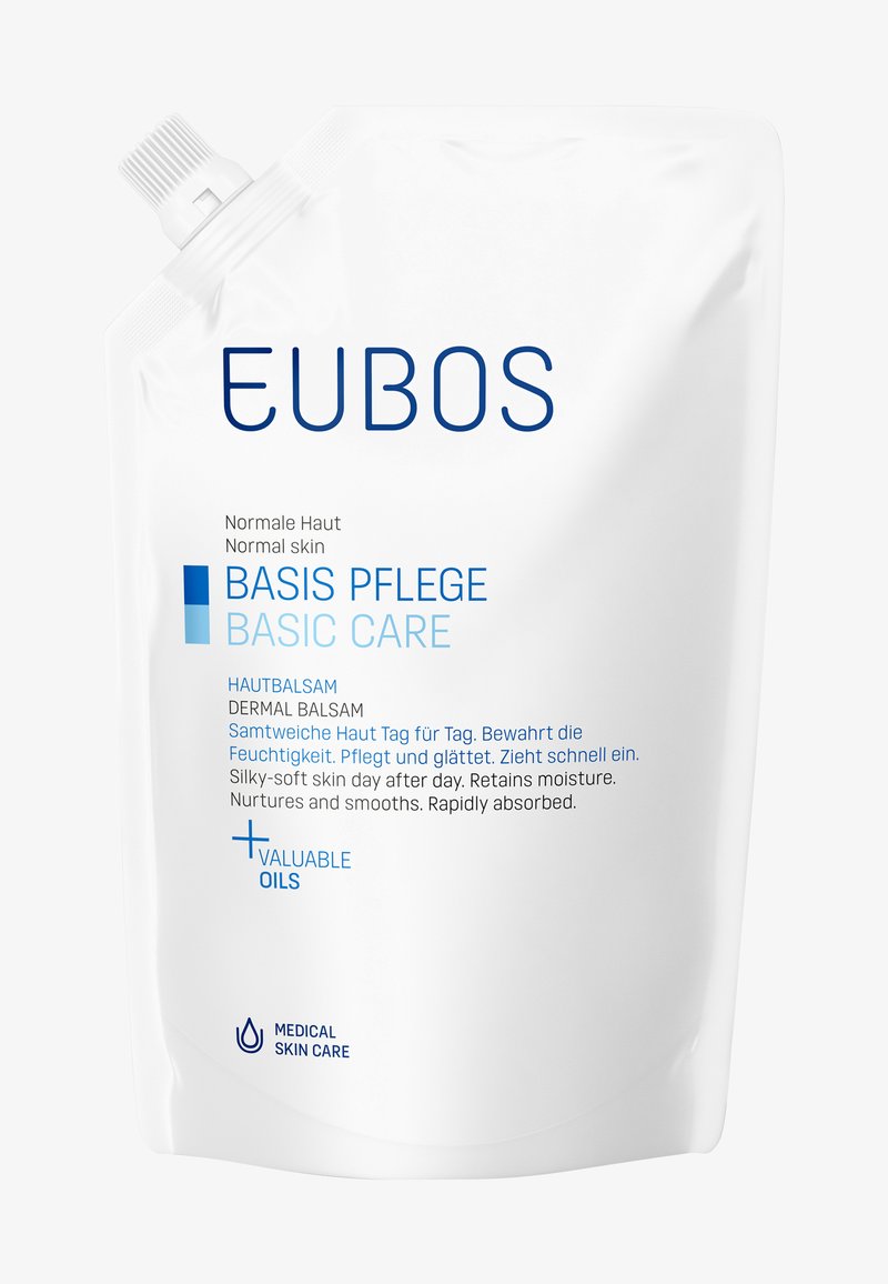 White pouch with a screw cap, featuring blue text. Labels indicate "EUBOS" and "Basis Pflege" in bold fonts. Contains skin care product details.