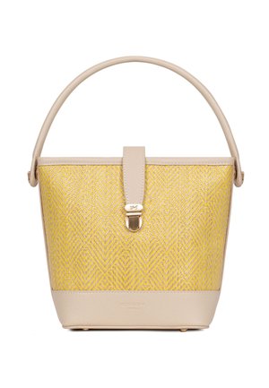 Sac seau à motifs jaunes avec garniture en cuir beige, anse unique et fermoir doré sur fond blanc.