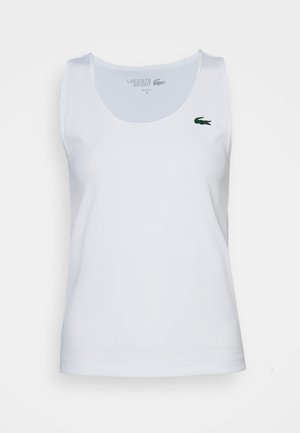 Balta be rankovių marškinėlį, raukšlėtas tekstūra, su siauru siluetu. Kairėje krūtinės pusėje yra mažas žalias Lacoste logotipas.