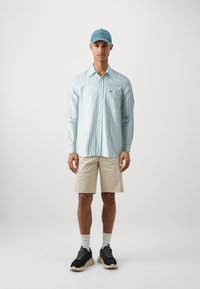 Lacoste Marškiniai - fluorine green/white