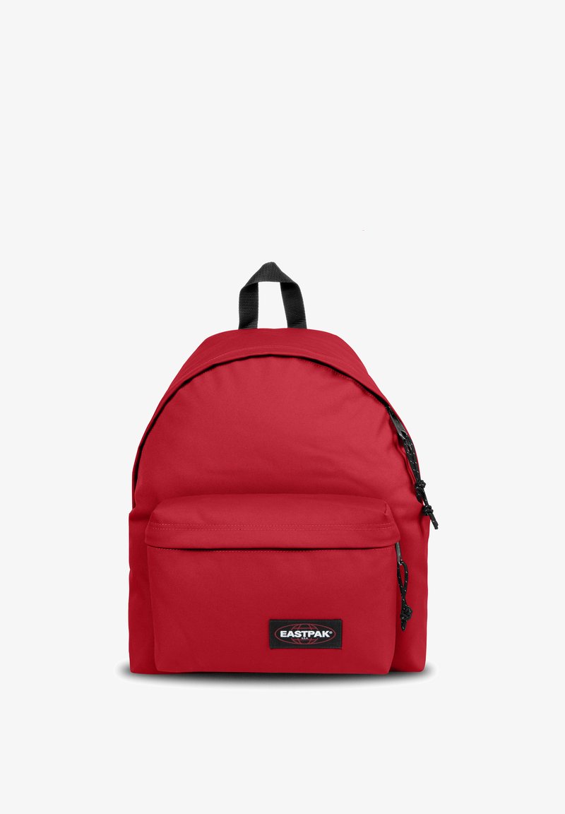 Red Eastpak backpack with a front zip pocket, black handle loop, and black zipper pulls, shown against a white background.
