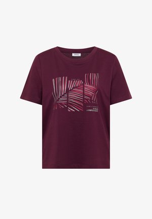 Burgundské tričko s krátkým rukávem a kulatým výstřihem, abstraktní pruhovaný design a text „Najdi radost“ a „Dej si pauzu, buduj sebevědomí“ na přední straně.