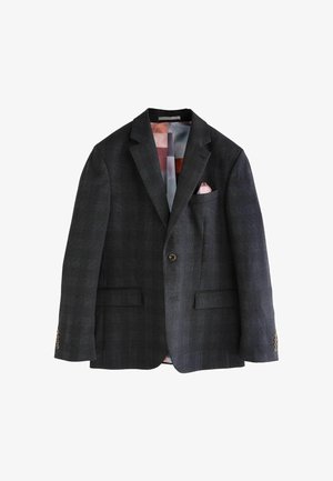 Tumehall hall/gtestikonstruktsiooniga bleiser, millel on tekstureeritud ruutmustrit, ühe nupuga kinnitamine, kaks esipokka ja värviline vooder. Lisade hulka kuulub ka taskuarv.