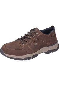 Scarpa in pelle marrone con lacci, caratterizzata da un colletto imbottito, cuciture a contrasto e una suola in gomma durevole con pattern di grip testurizzati.