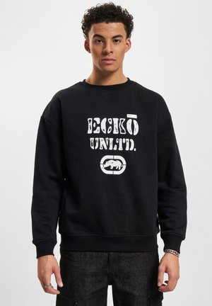 Black sweatshirt with a round neckline, featuring a large white print "ECKO UNLTD." and a bear logo. Fitted cuffs and hem, soft texture.