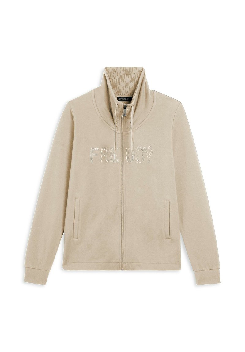 Giacca beige con zip e colletto alto. La scritta "FRIDAY" in strass luccicanti sulla parte anteriore. Tessuto morbido con una texture liscia e tasche laterali.