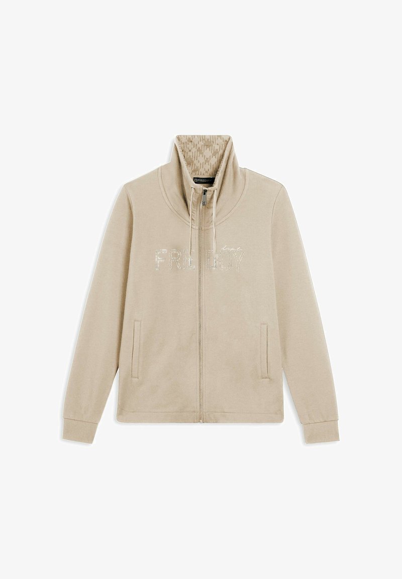 Giacca beige con zip e colletto alto. La scritta "FRIDAY" in strass luccicanti sulla parte anteriore. Tessuto morbido con una texture liscia e tasche laterali.