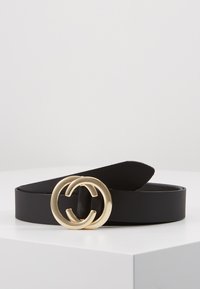 Black leather belt featuring a gold double 'C' buckle, smooth texture, and a sleek design with a rounded end.