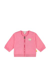 Cardigan di cotone rosa con maniche lunghe, zip frontale e dettaglio della patch di un orso sul petto. Texture morbida e design casual.