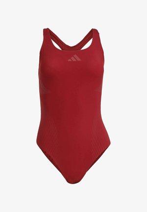 Red one-piece swimsuit with a scoop neck, crisscross straps, and subtle diagonal stripes. Made from smooth, stretchy material.