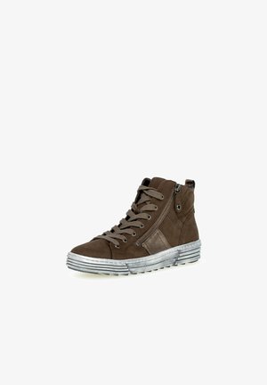 Brown suede ankle boot with metal zipper and grey rubber sole. Features laces and contrasting side panel, textured fabric, and streamlined silhouette.