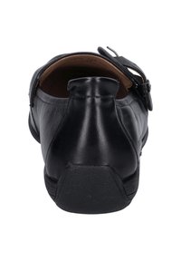 Czarny skórzany but z zaokrąglonym obcasem, detalem klamry, gładką teksturą oraz wytrzymałą gumową podeszwą. Posiada niski krój z tyłu.