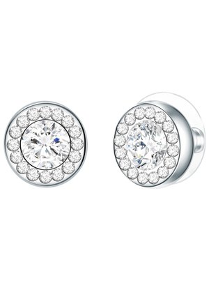 Boucles d'oreilles rondes avec une grande pierre claire centrale entourée de plus petites pierres claires dans un cadre argenté.