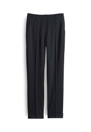 Pantalons formels noirs avec passants de ceinture, poches latérales obliques, plis avant et ourlets repliés, présentés sur un fond blanc.