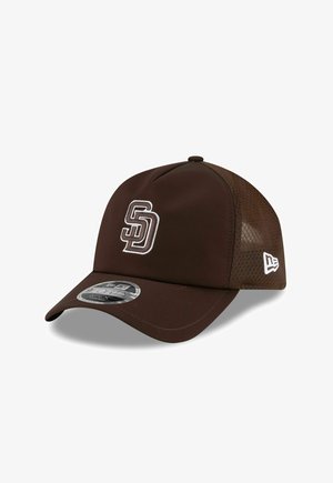 Brown baseball cap with white embroidered "SD" logo on front and mesh back panel, featuring a curved brim and New Era branding.