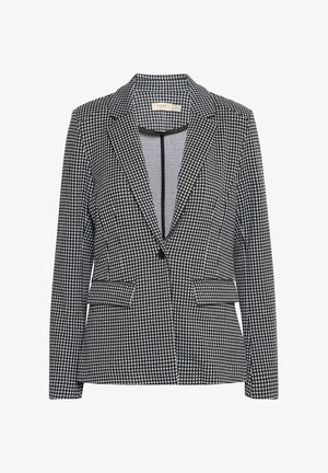 Fekete-fehér houndstooth mintás blézer, feltűzött hajtókával, egysoros gombolással és két elülső zsebbel. Texturált anyagból készült.