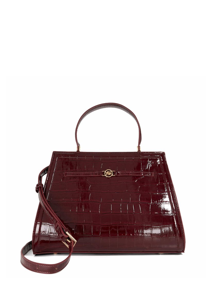 Burgundy croc-embossed handbag with a structured shape, top handle, detachable strap, and gold-tone logo accent on the front.