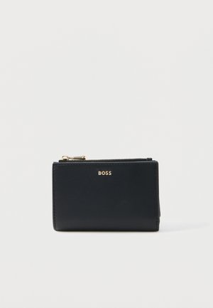 Black leather wallet with gold zipper and gold "BOSS" logo on front, displayed against a plain light gray background.