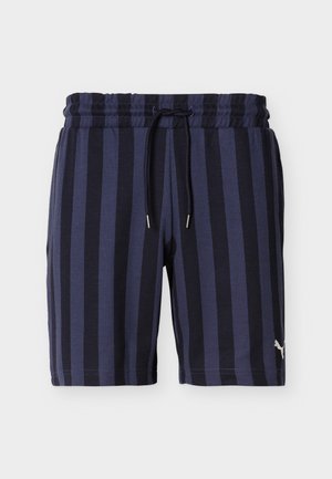 Temno modri in črni kratki hlače z navpičnimi črtami, elastičnim pasom in črnim vrvico za zategovanje, z majhnim belim logotipom Puma na levi nogi.