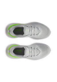 Light gray athletic shoes with a mesh upper, neon green accents, and flat laces. Features a cushioned sole with "COMFORT DELUXE SYSTEM" text.