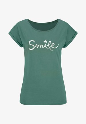 Green T-shirt with a soft texture, rounded neckline, rolled sleeves, and white "Smile" text featuring a star accent.
