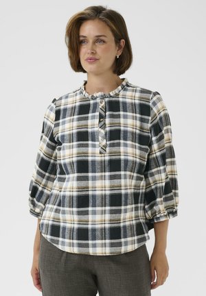 Karierte Bluse in Schwarz, Weiß und Gelb mit einem Rüschenausschnitt, Knopfleiste und Dreiviertelärmeln. Weicher Flanellstoff.