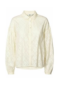 Crèmekleurige blouse met een kraag, gestructureerde stof, knopen aan de voorkant en puffige lange mouwen. Subtiel bloemenpatroon overal.