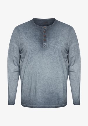 Langarmshirt in einem Verlauf von hell- zu dunkelgrau. Verfügt über einen Henley-Ausschnitt mit vier braunen Knöpfen und einem weichen, strukturierten Stoff.