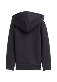 Felpa grigia scura con cappuccio grande e regolabile, maniche lunghe e polsini e orlo a coste. Tessuto morbido con una texture liscia.
